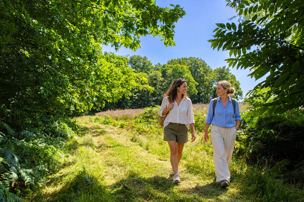 Two people explore the HappyLand property near Monteneuf in Brittany